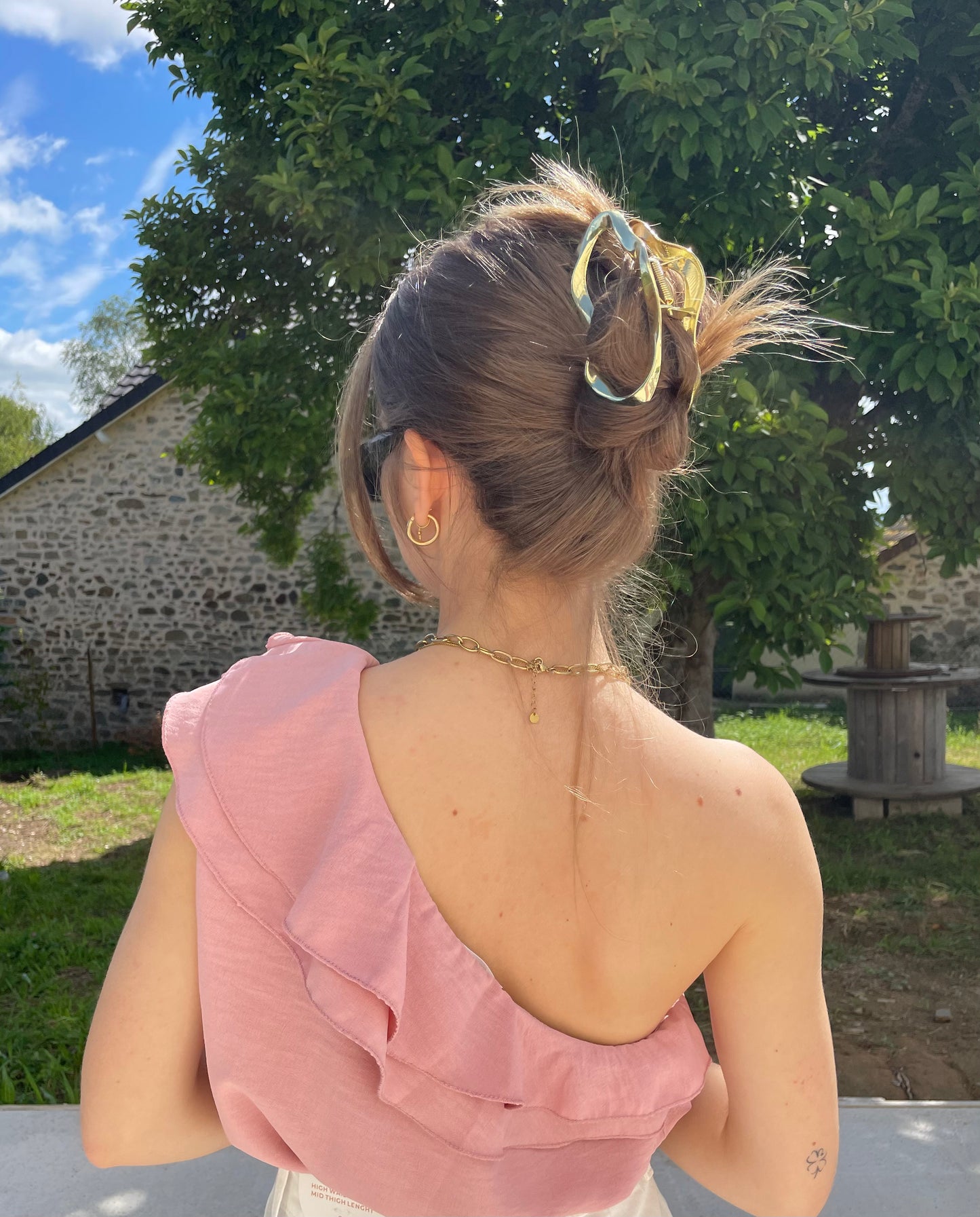 Top asymétrique rose